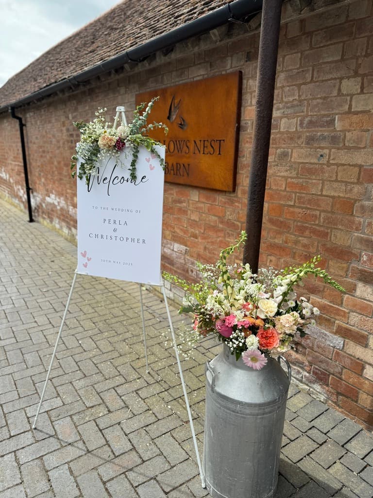 Flowers dressing a barn entrance